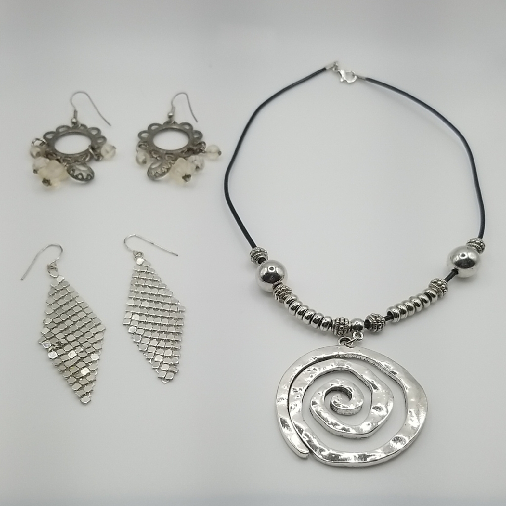 Silver Spiral Dangle Earrings with Geometric Designs